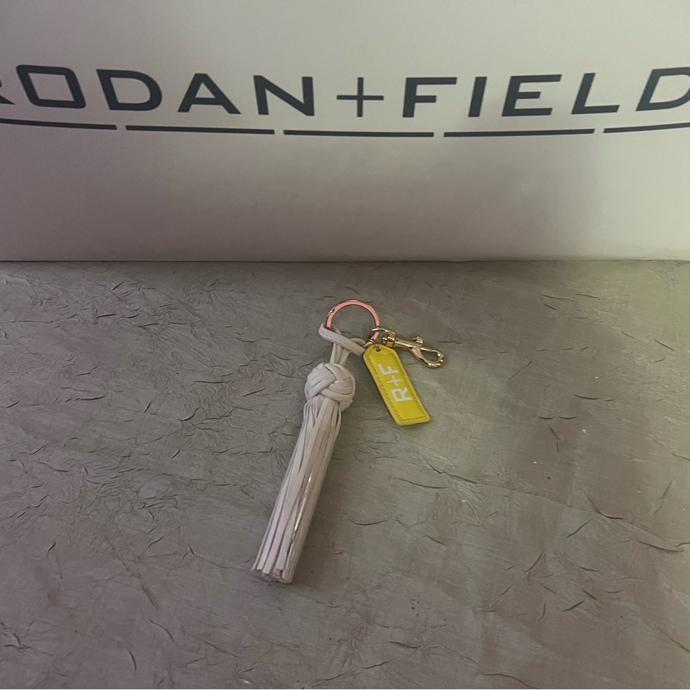 Rodan + Fields Keychain Tassel Charm R+F Logo Gold Clip - Never used